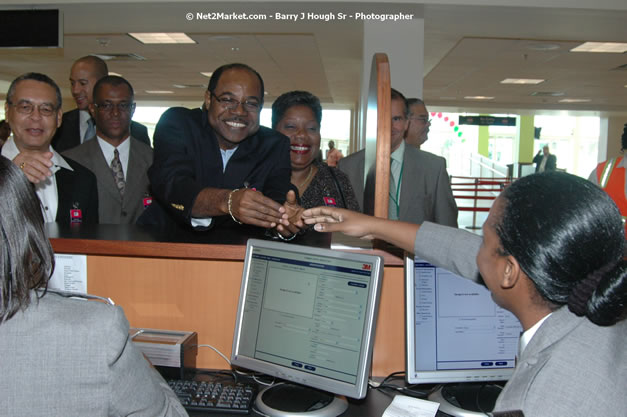 Minister of Tourism, Hon. Edmund Bartlett - Director of Tourism, Basil Smith, and Mayor of Montego Bay, Councillor Charles Sinclair Launch of Winter Tourism Season at Sangster International Airport, Saturday, December 15, 2007 - Sangster International Airport - MBJ Airports Limited, Montego Bay, Jamaica W.I. - Photographs by Net2Market.com - Barry J. Hough Sr, Photographer - Negril Travel Guide, Negril Jamaica WI - http://www.negriltravelguide.com - info@negriltravelguide.com...!