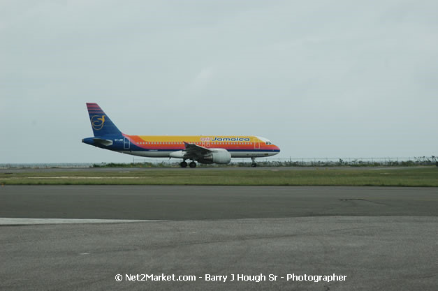 Air Jamaica Airline - Landing & Take Off - MBJ Airports Limited - Sangster International Airport - Domestic Terminal - Montego Bay, St James, Jamaica W.I. - MBJ Limited - Transforming Sangster International Airport into a world class facility - Photographs by Net2Market.com - Negril Travel Guide, Negril Jamaica WI - http://www.negriltravelguide.com - info@negriltravelguide.com...!