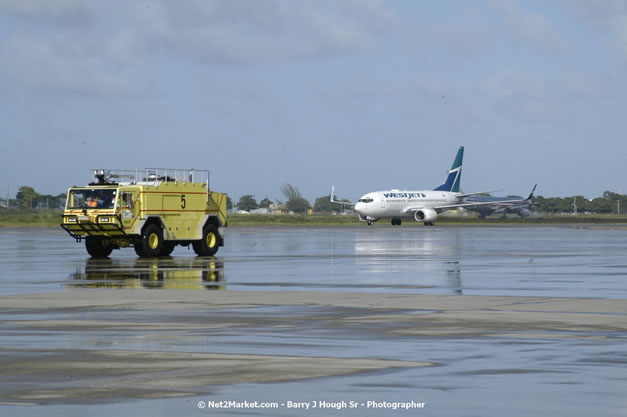 MBJ Airports Limited Welcomes WestJet Airlines - Inaugural Scheduled Service From Toronto Pearsons International Airport - Monday, December 10, 2007 - Sangster International Airport - MBJ Airports Limited, Montego Bay, Jamaica W.I. - Photographs by Net2Market.com - Barry J. Hough Sr, Photographer - Negril Travel Guide, Negril Jamaica WI - http://www.negriltravelguide.com - info@negriltravelguide.com...!