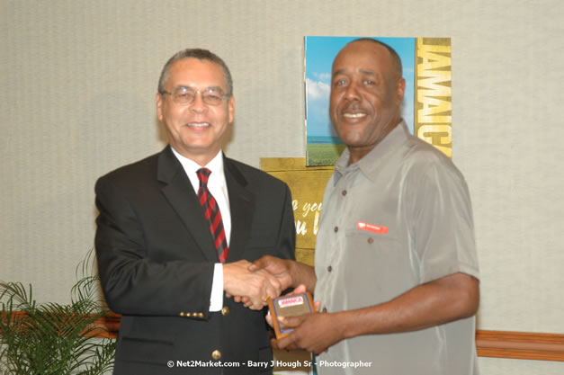 Red Cap Porters Awards - Minister of Tourism, Hon. Edmund Bartlett - Director of Tourism, Basil Smith - Friday, December 14, 2007 - Holiday Inn Sunspree, Montego Bay, Jamaica W.I. - Photographs by Net2Market.com - Barry J. Hough Sr, Photographer - Negril Travel Guide, Negril Jamaica WI - http://www.negriltravelguide.com - info@negriltravelguide.com...!