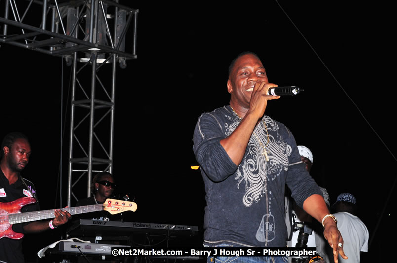 Lucea Cross the Harbour @ Lucea Car Park - All Day Event - Cross the Harbour Swim, Boat Rides, and Entertainment for the Family - Concert Featuring: Bushman, George Nooksl, Little Hero, Bushi One String, Dog Rice and many local Artists - Friday, August 1, 2008 - Lucea, Hanover Jamaica - Photographs by Net2Market.com - Barry J. Hough Sr. Photojournalist/Photograper - Photographs taken with a Nikon D300 - Negril Travel Guide, Negril Jamaica WI - http://www.negriltravelguide.com - info@negriltravelguide.com...!