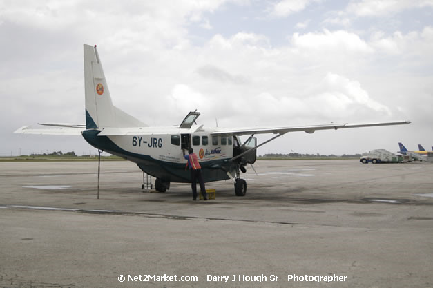 Intl. Airl Link - The Ultimate Connection - MBJ Airports Limited - Sangster International Airport - Domestic Terminal - Montego Bay, St James, Jamaica W.I. - MBJ Limited - Transforming Sangster International Airport into a world class facility - Photographs by Net2Market.com - Negril Travel Guide, Negril Jamaica WI - http://www.negriltravelguide.com - info@negriltravelguide.com...!