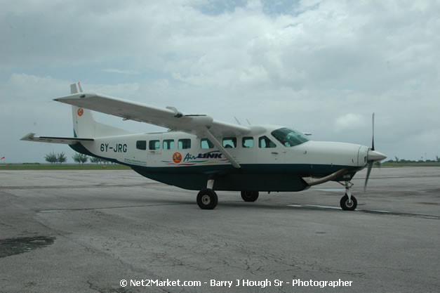 Intl. Airl Link - The Ultimate Connection - MBJ Airports Limited - Sangster International Airport - Domestic Terminal - Montego Bay, St James, Jamaica W.I. - MBJ Limited - Transforming Sangster International Airport into a world class facility - Photographs by Net2Market.com - Negril Travel Guide, Negril Jamaica WI - http://www.negriltravelguide.com - info@negriltravelguide.com...!