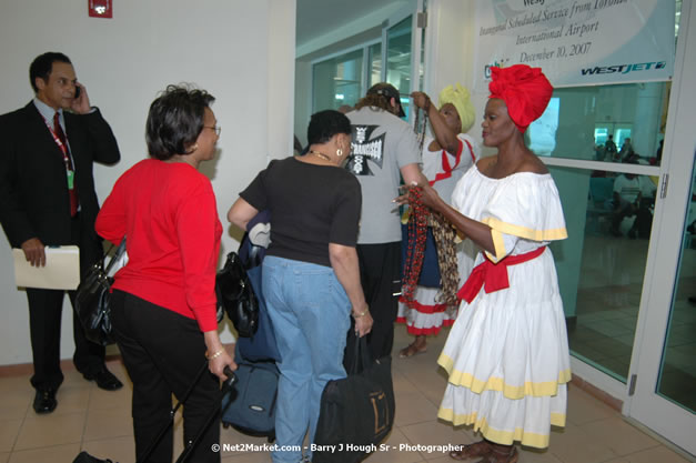 MBJ Airports Limited Welcomes WestJet Airlines - Inaugural Scheduled Service From Toronto Pearsons International Airport - Monday, December 10, 2007 - Sangster International Airport - MBJ Airports Limited, Montego Bay, Jamaica W.I. - Photographs by Net2Market.com - Barry J. Hough Sr, Photographer - Negril Travel Guide, Negril Jamaica WI - http://www.negriltravelguide.com - info@negriltravelguide.com...!