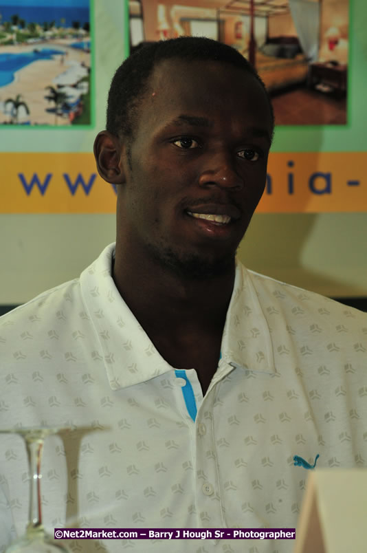 Usain Bolt of Jamaica - The Fastest Man In The World  - Usain Bolt Homecoming Celebrations - Press Conference at the Grand Bahia Principe &amp; Sherwood Content - Waldensia Primary School - Photographs by Net2Market.com - Barry J. Hough Sr. Photojournalist/Photograper - Photographs taken with a Nikon D300 - Negril Travel Guide, Negril Jamaica WI - http://www.negriltravelguide.com - info@negriltravelguide.com...!