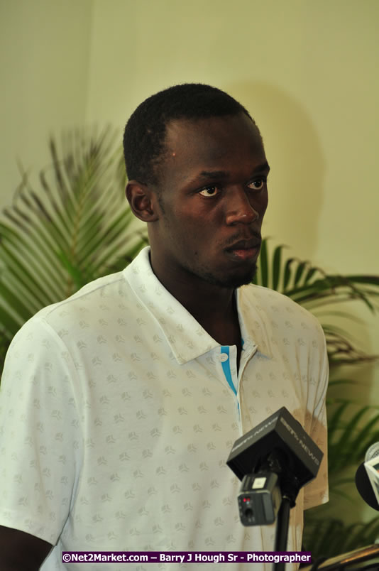 Usain Bolt of Jamaica - The Fastest Man In The World  - Usain Bolt Homecoming Celebrations - Press Conference at the Grand Bahia Principe &amp; Sherwood Content - Waldensia Primary School - Photographs by Net2Market.com - Barry J. Hough Sr. Photojournalist/Photograper - Photographs taken with a Nikon D300 - Negril Travel Guide, Negril Jamaica WI - http://www.negriltravelguide.com - info@negriltravelguide.com...!