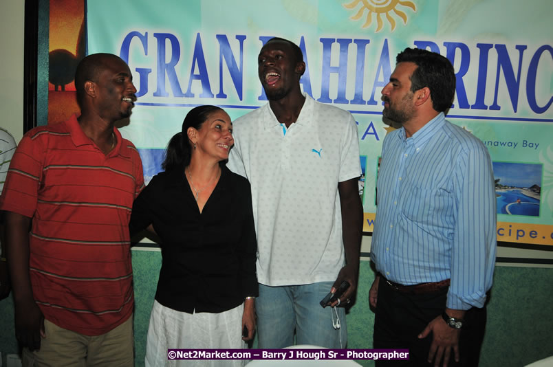 Usain Bolt of Jamaica - The Fastest Man In The World  - Usain Bolt Homecoming Celebrations - Press Conference at the Grand Bahia Principe &amp; Sherwood Content - Waldensia Primary School - Photographs by Net2Market.com - Barry J. Hough Sr. Photojournalist/Photograper - Photographs taken with a Nikon D300 - Negril Travel Guide, Negril Jamaica WI - http://www.negriltravelguide.com - info@negriltravelguide.com...!